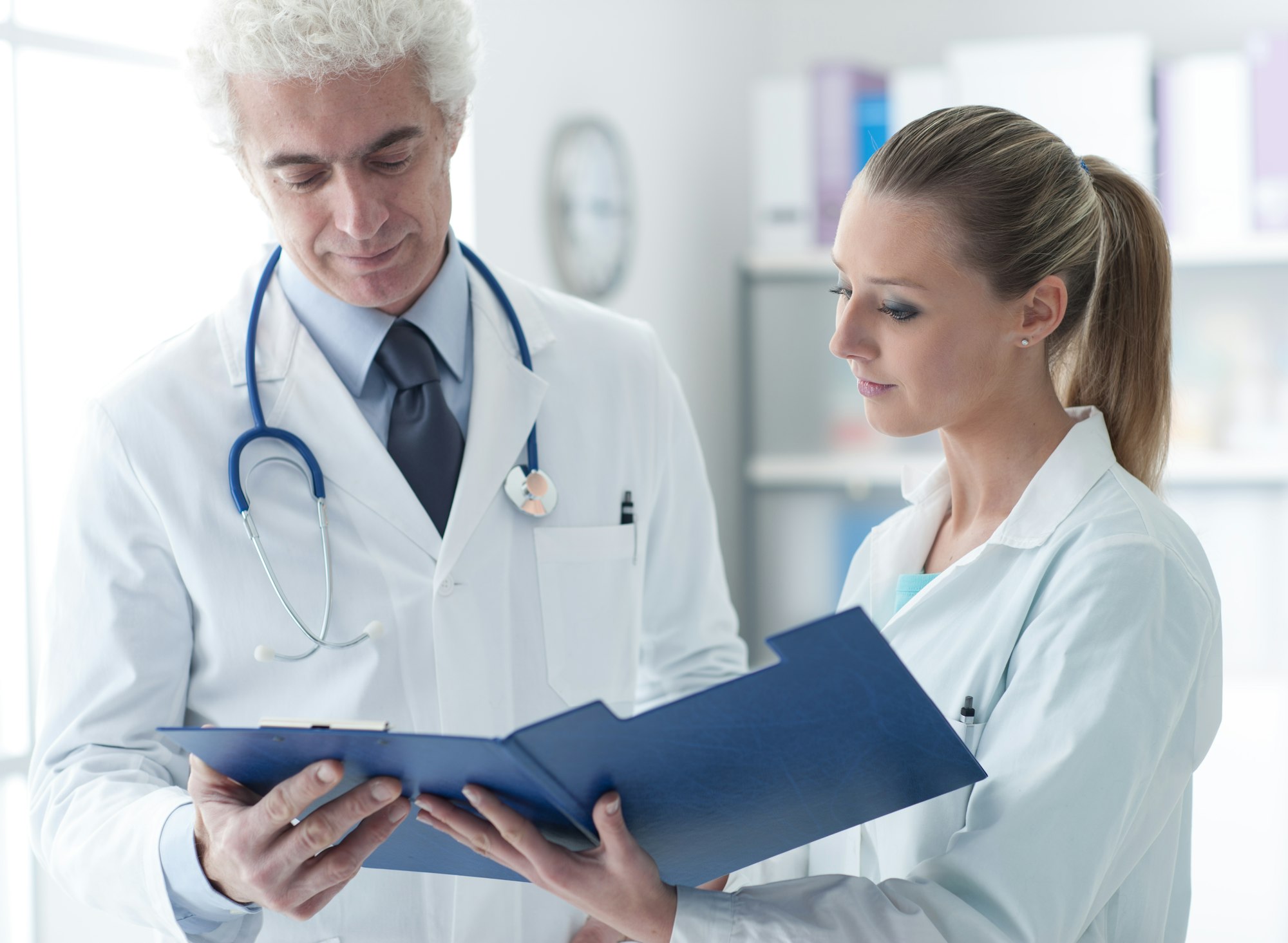 Doctor checking medical records