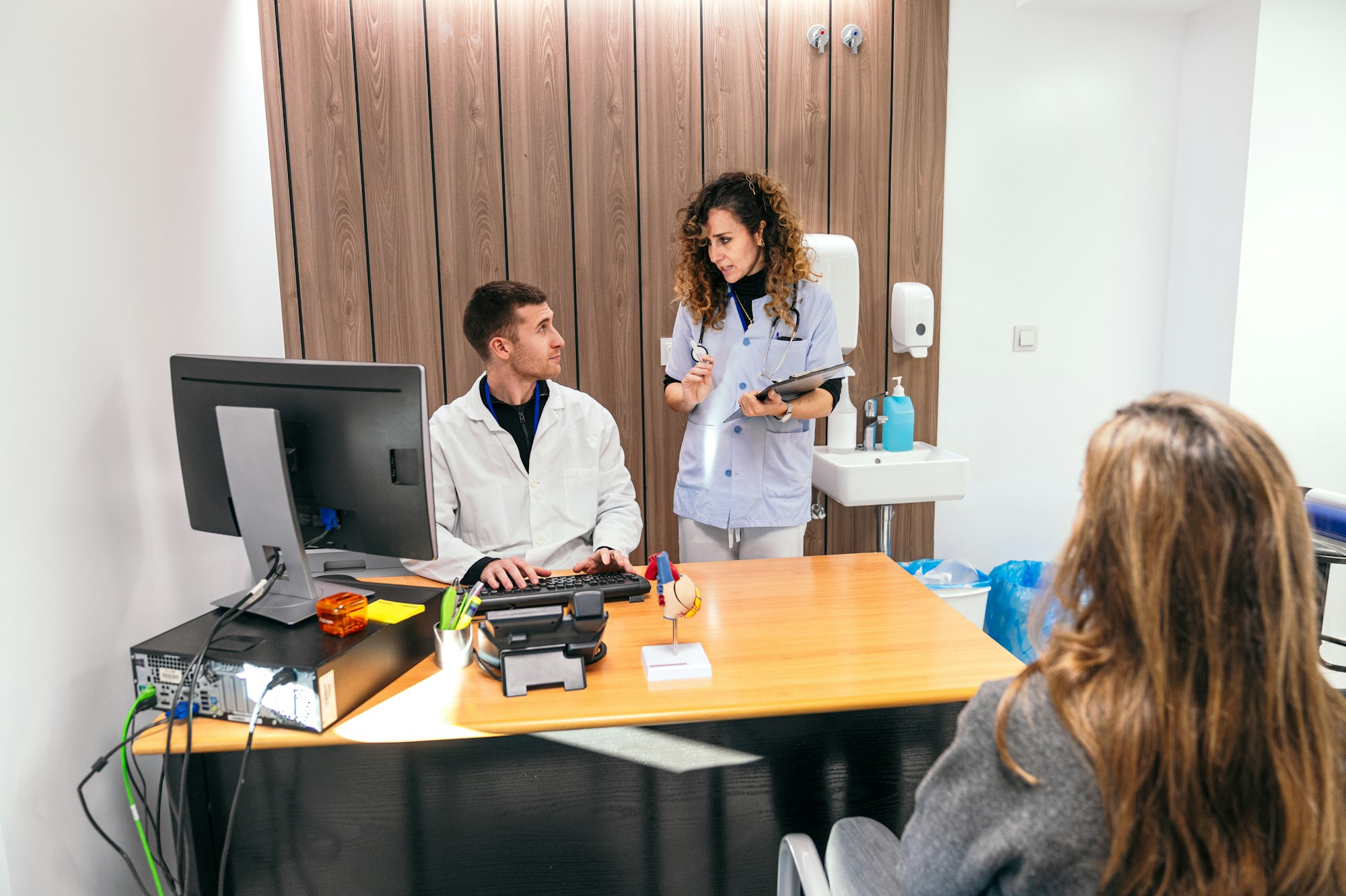 Nurse Reviewing Patient's Medical Records